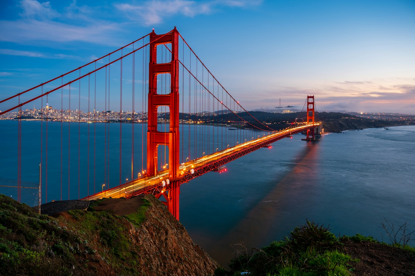 Golden Gate Bridge illuminated at dusk in San Francisco